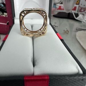 A different look. Square gold ring